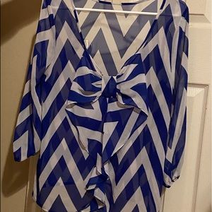 By Moonlight. Bright blue blouse with a bow on the front. Light and chic.